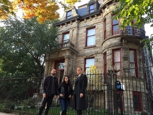 Hosts Katrina Weidman, Nick Groff and guest John E.L. Tenney in front of Franklin Castle.
